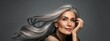 © JovialFox - woman with gray hair, Caucasian female long wavy hair beauty salon portrait, concept of healthy hair, natural hair, hair care