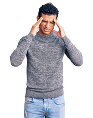 Sticker - Hispanic handsome young man wearing casual sweater with hand on head for pain in head because stress. suffering migraine.