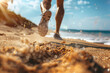 close up of male legs jogging on the sandy beach