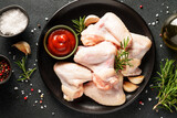 Fototapeta Mapy - Chicken wing, raw chicken meat with herbs.