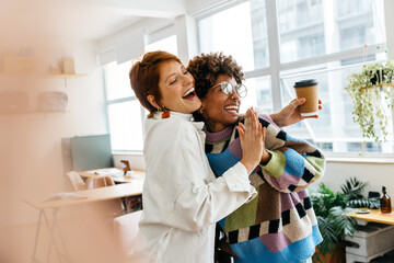 Colleagues collaborating in a bright co-working space