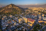 Fototapeta Natura - Beautiful aerial view of the San Cristobal Hill and the city of Santiago de Chile