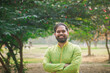 Portrait of Cheerful Happy handsome indian man looking in front of the camera. Indian man in traditional wear or kurta pyjama cloths 