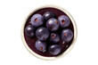 Fresh acai berries with fruit puree, topview and isolated
