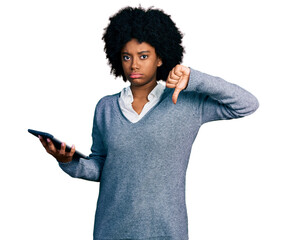 Poster - Young african american woman using touchpad device with angry face, negative sign showing dislike with thumbs down, rejection concept