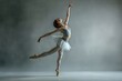 Elegance and athleticism as a ballerina performs dance moves, showcasing flexibility and strength on a subtle background.
