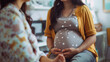 At a doctor's appointment, a pregnant woman receives care and guidance from her healthcare provider.