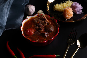 Wall Mural - Nam Ngiao Rice Noodle Traditional northern local Thaifood food isolated in black background