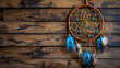 a Native american dream catcher on wooden background
