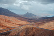 Asphalt winding mountain roads. In the desert area of Fuerteventura.