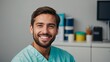Portrait of happy young dentist standing in dental clinic