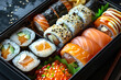 Assorted Sushi and Rolls in Elegant Black Tray.
