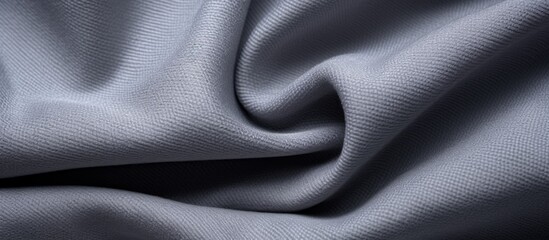 Poster - Detailed view of a plain blue textile with a delicate print, showcasing a minimalistic and elegant aesthetic