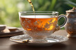 Black tea is poured into beautiful transparent transparent cup of white glass with floral pattern