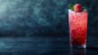 Tall Glass Filled With Ice and Raspberry