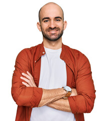 Canvas Print - Young hispanic man wearing casual clothes happy face smiling with crossed arms looking at the camera. positive person.