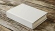 mockup of a blank book lying flat on a wooden table. Showcase the simplicity and elegance of the design, inviting viewers to imagine their own story within