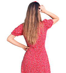 Canvas Print - Young beautiful girl wearing dress and diadem backwards thinking about doubt with hand on head