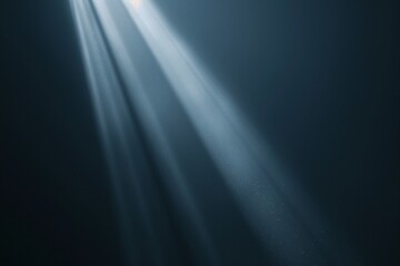 digital rays of hope: a soft ray of light with a subtle volumetric effect cuts through a dark websit