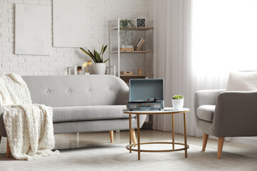 Canvas Print - Record player with vinyl disk on table in living room