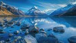 Majestic Mount Cook overlooking tranquil lake in rugged outdoors