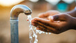African child reaches for clean water, symbolizing hope and access to basic needs