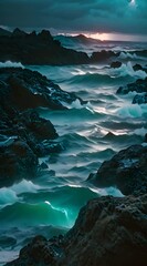 Wall Mural - a view of a body of water with rocks in the foreground