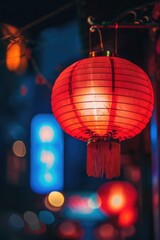 Poster - A vibrant red paper lantern hanging from a string. Perfect for adding a pop of color to any setting