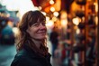 Portrait of a middle-aged woman on the background of the Christmas market