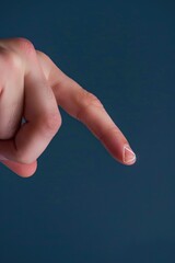 Poster - A person pointing at something with their finger. Suitable for business presentations