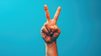 Poster - A person making a peace sign gesture. Suitable for various concepts and designs