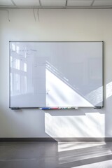 Poster - White board hanging on wall in room with window, suitable for educational or office concept