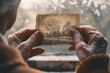 Captured through the lens of a bygone era, this sepia photograph held by aging hands evokes a sense of timeless beauty and enduring memory