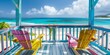A colorful wooden balcony overlooking the turquoise ocean and white sandy beach, with pastel colored chairs on each side. The scene is set in an exotic island paradise.