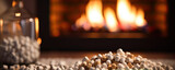 Fototapeta  - Compressed wood pellets infront of fireplace. Firewood copy space for your text.