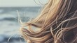 An image of lightly textured hair against a backdrop of sea waves or coastal breezes, creating a feeling of freshness and lightness. --no text, titles --ar 16:9 --quality 0.5 --stylize 0 Job ID