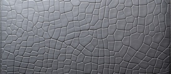 Poster - A white tiled wall is seen up close, featuring a meticulous pattern of tiny squares creating a visually appealing design