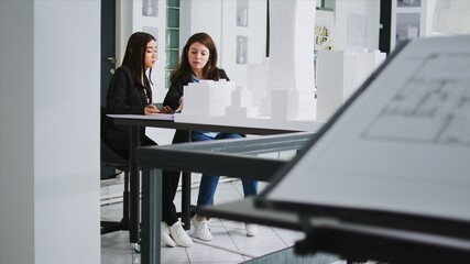 Poster - Development staff produces plan for interior design in agency workplace, estimating 3D printed structure size and specifications. Engineers use maquette to track dimensions of real settings.