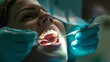 Dentist working on patient’s mouth in dental clinic.