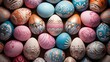 Pastel-colored Easter eggs arranged in a decorative pattern