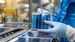 A closeup of a worker holding a small solar panel in front of a production line focusing on the intricate details of the manufacturing . .