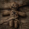 A mystical voodoo doll texture, crafted from burlap and bound with twine, featuring dark magic influences created with Generative AI Technology