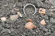 Close-up of old broken potteries on the ground