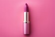pink lipstick on pink background . cosmetics backdrop. 