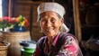 A close-up portrait of a smiling elderly Asian woman from the Akha tribe in her home, Myanmar. The Indochina Peninsula is a multiethnic country.