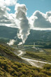 Harnessing of geothermal energy for power generation, featuring geothermal plants and the technology involved.