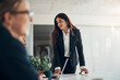 © Flamingo Images - Manager listening to her team during a boardroom meeting in an office