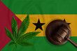 Cannabis leaf and judge gavel on the San Tome and Principe flag background