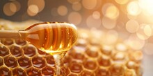 Golden Honey Being Dripped Onto A Honeycomb
