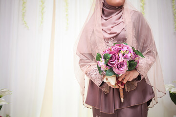 Wall Mural - Wedding bouquet of flowers. Bride holding bouquet of roses.